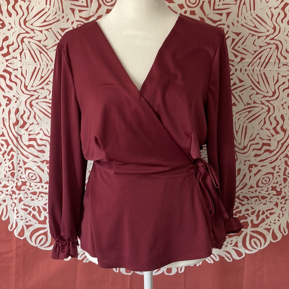 Peplum maroon long sleeve top
